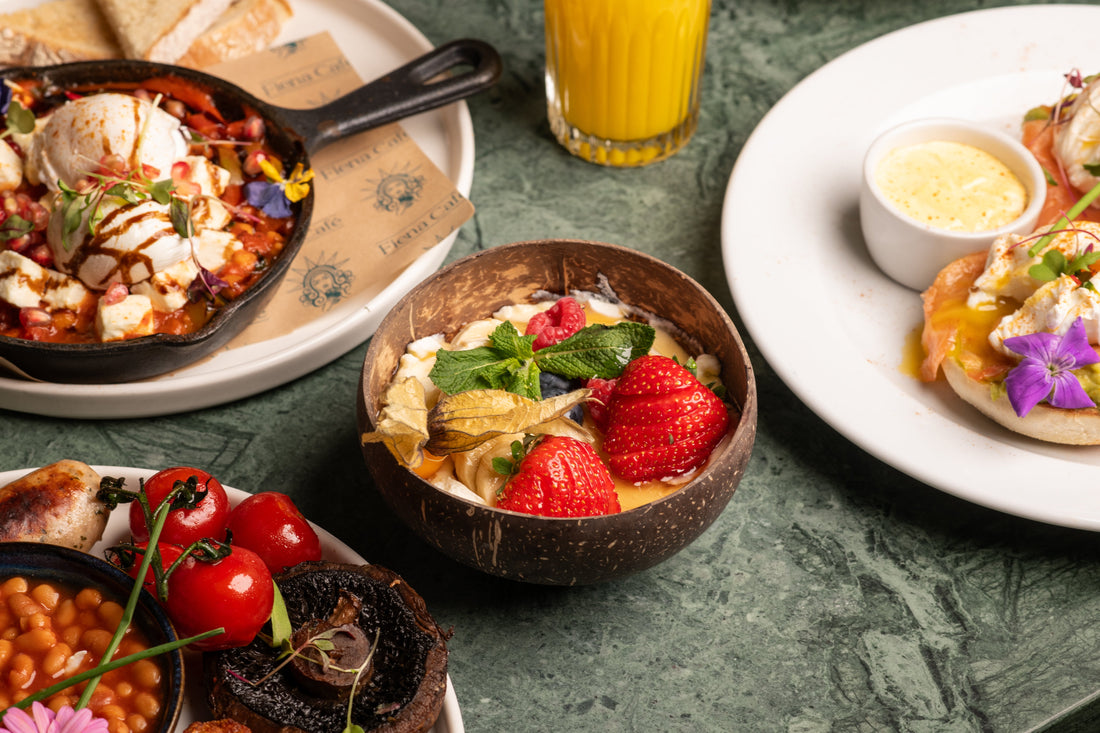 Vegetarian breakfast dishes including smoothie bowl and eggs at Fiena, King's Cross