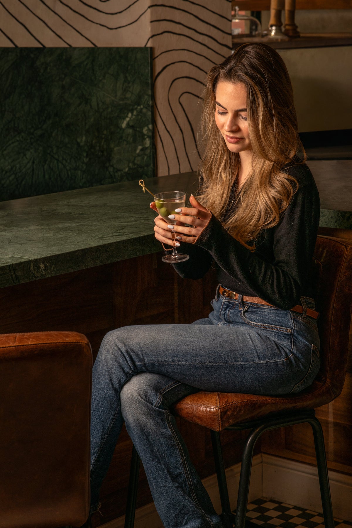 A martini served at the green marble bar at Fiena, King's Cross