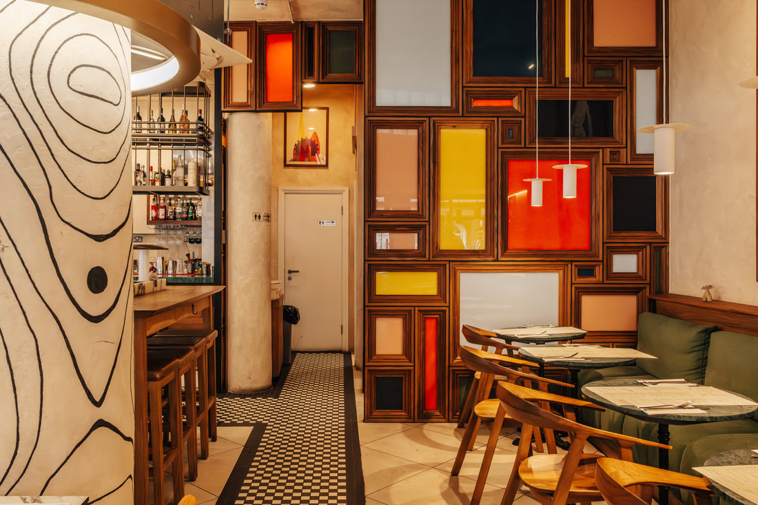 The bar at Fiena, King's Cross, with spirits shelves and mosaic floor